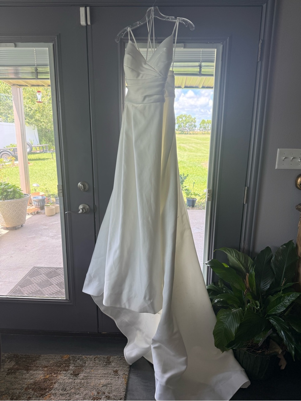 Satin White Bridal Gown with V-Neck and A-Line Skirt with Chapel Train. Modest